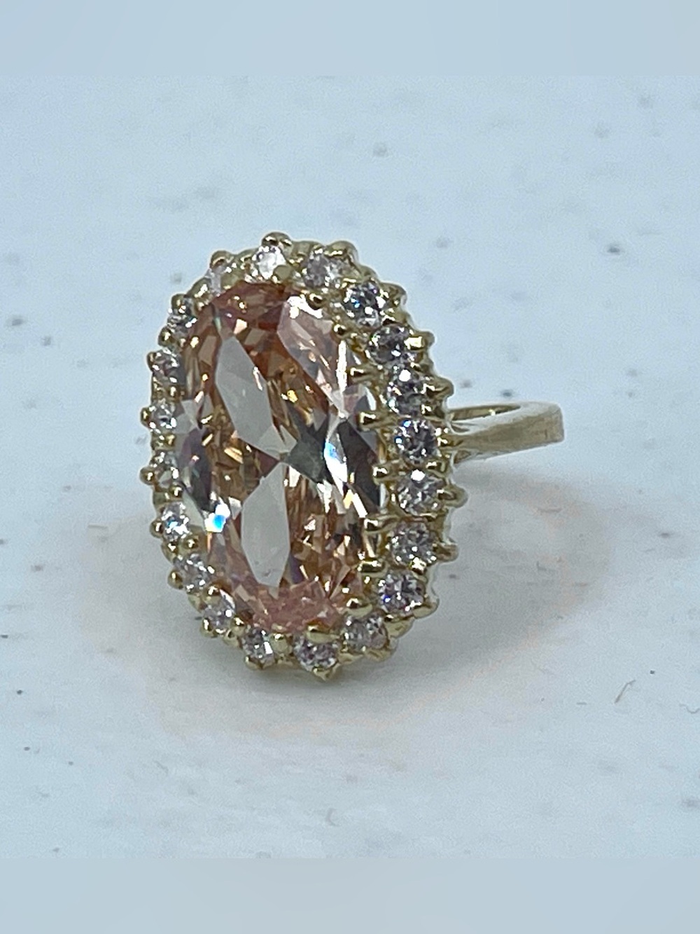 Fashion gold toned large peach oval stone ring